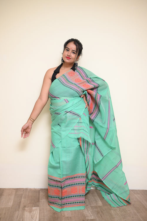 Mint Elegance – Semi Nuni Mekhela Sador with Woven Tribal Borders (With Unstitched Blouse Piece)