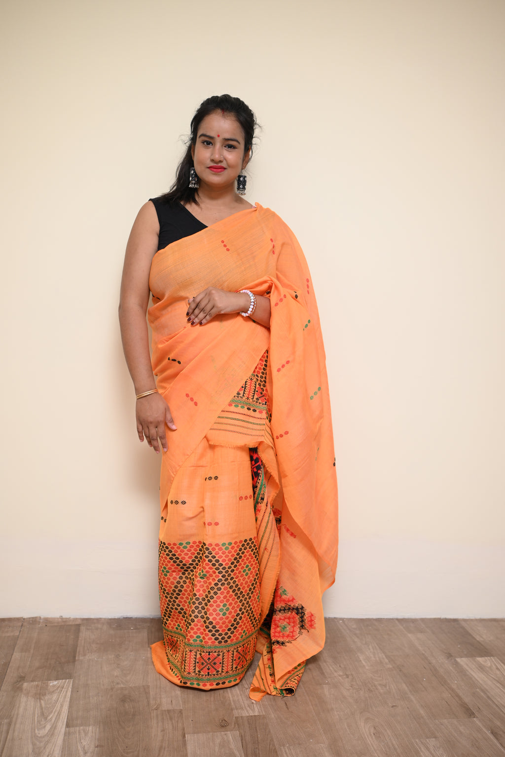 Orange Semi Nuni Mekhela Sador with Ethnic Motifs (Ready to Wear)