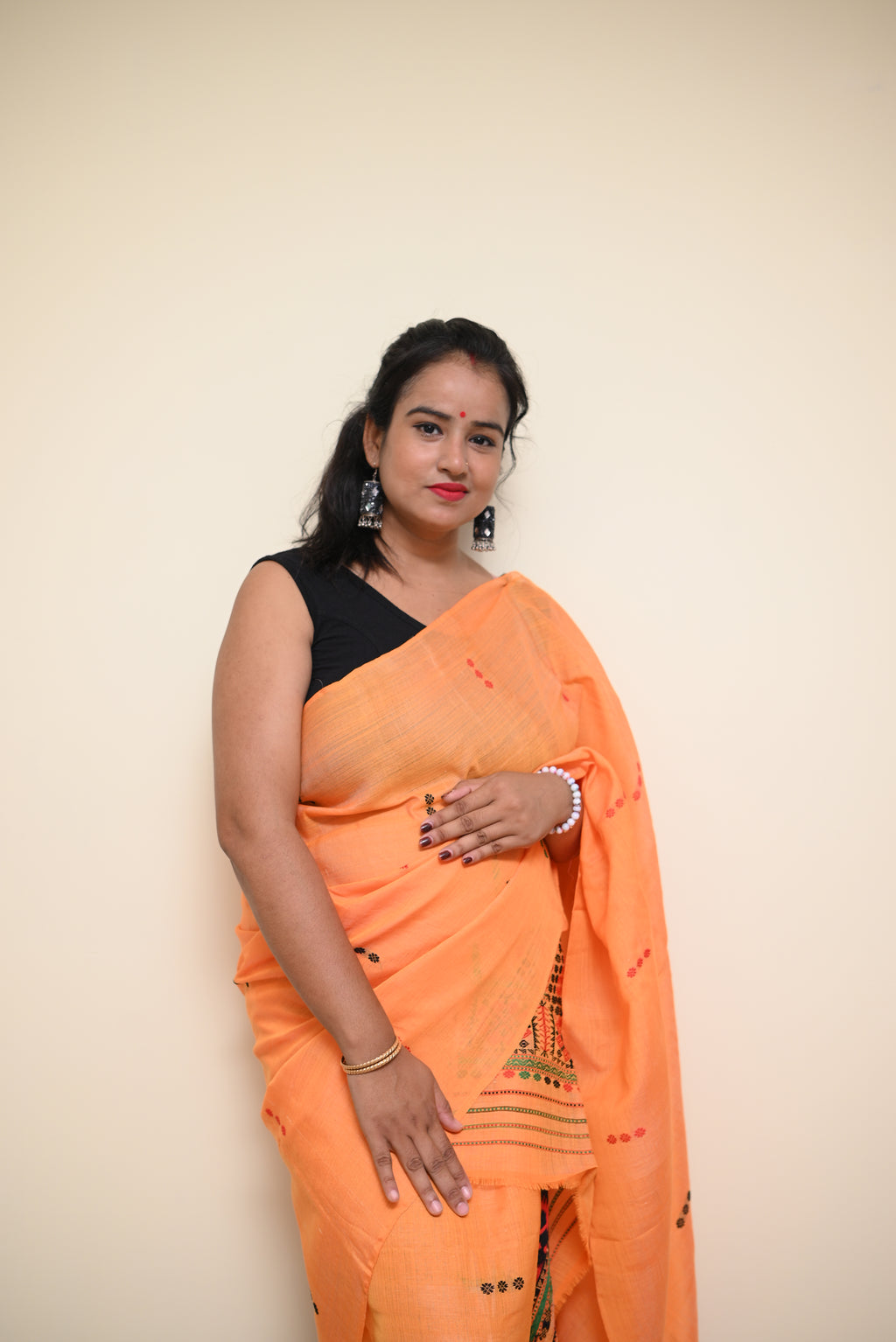 Orange Semi Nuni Mekhela Sador with Ethnic Motifs (Ready to Wear)