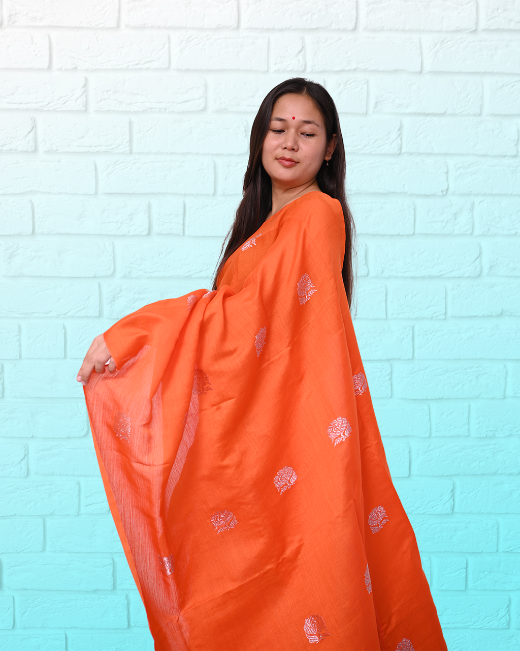 Handcrafted Orange Colored Kesapat Cotton Mekhela Sador with Unstitched Blouse Piece